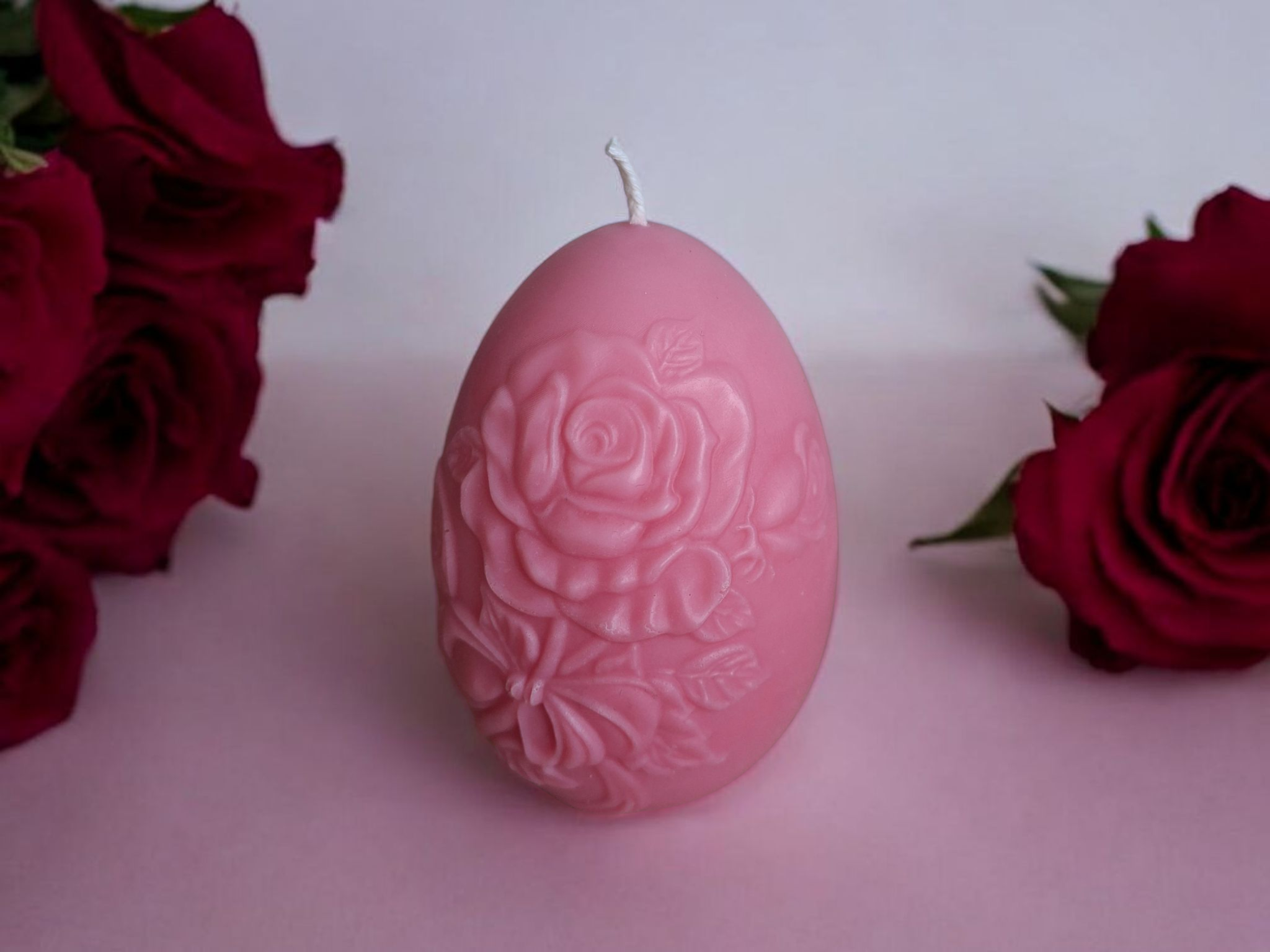 Ei vormige kaars met rozen