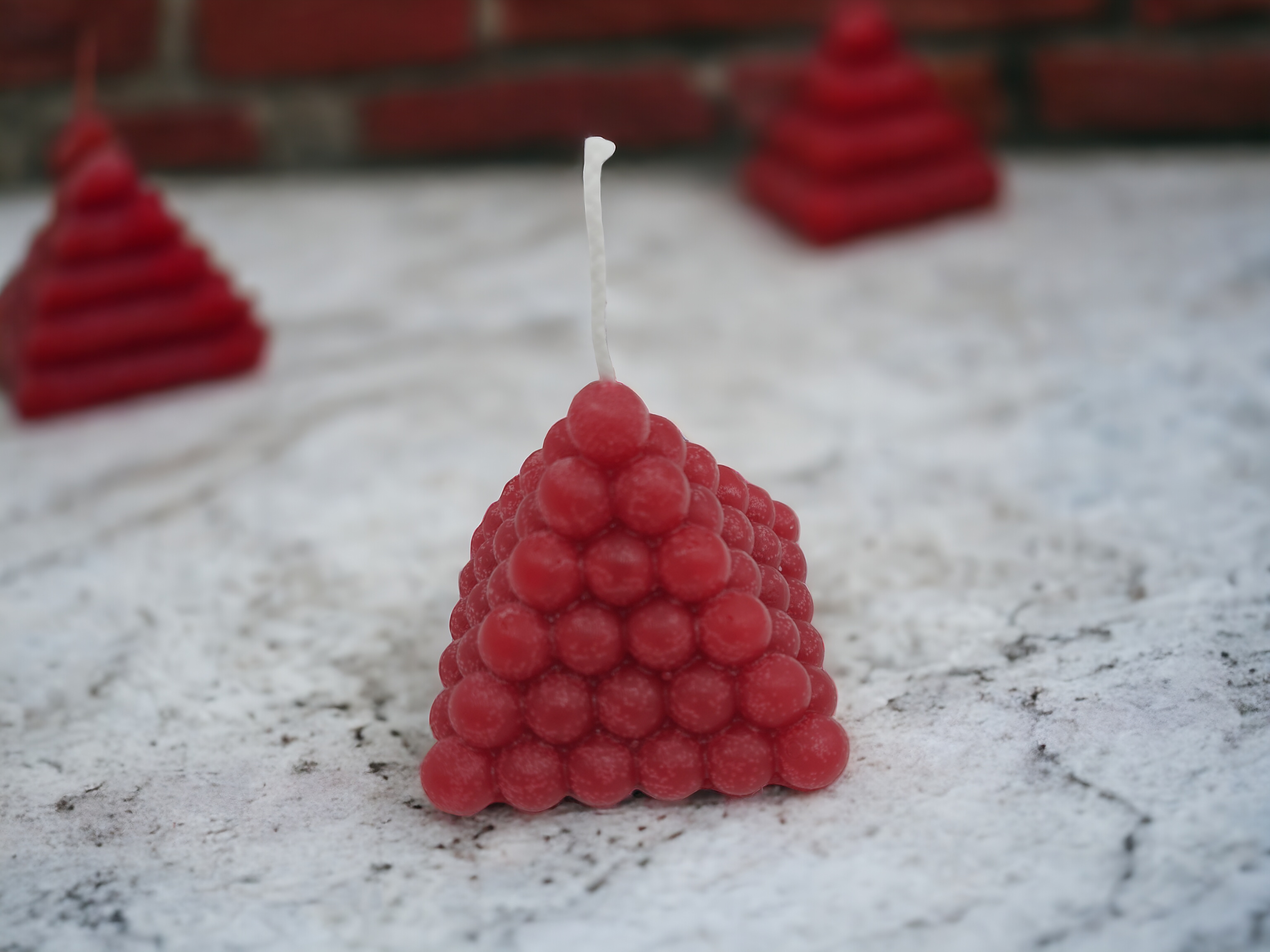 Kleine bolletjes piramide kaars